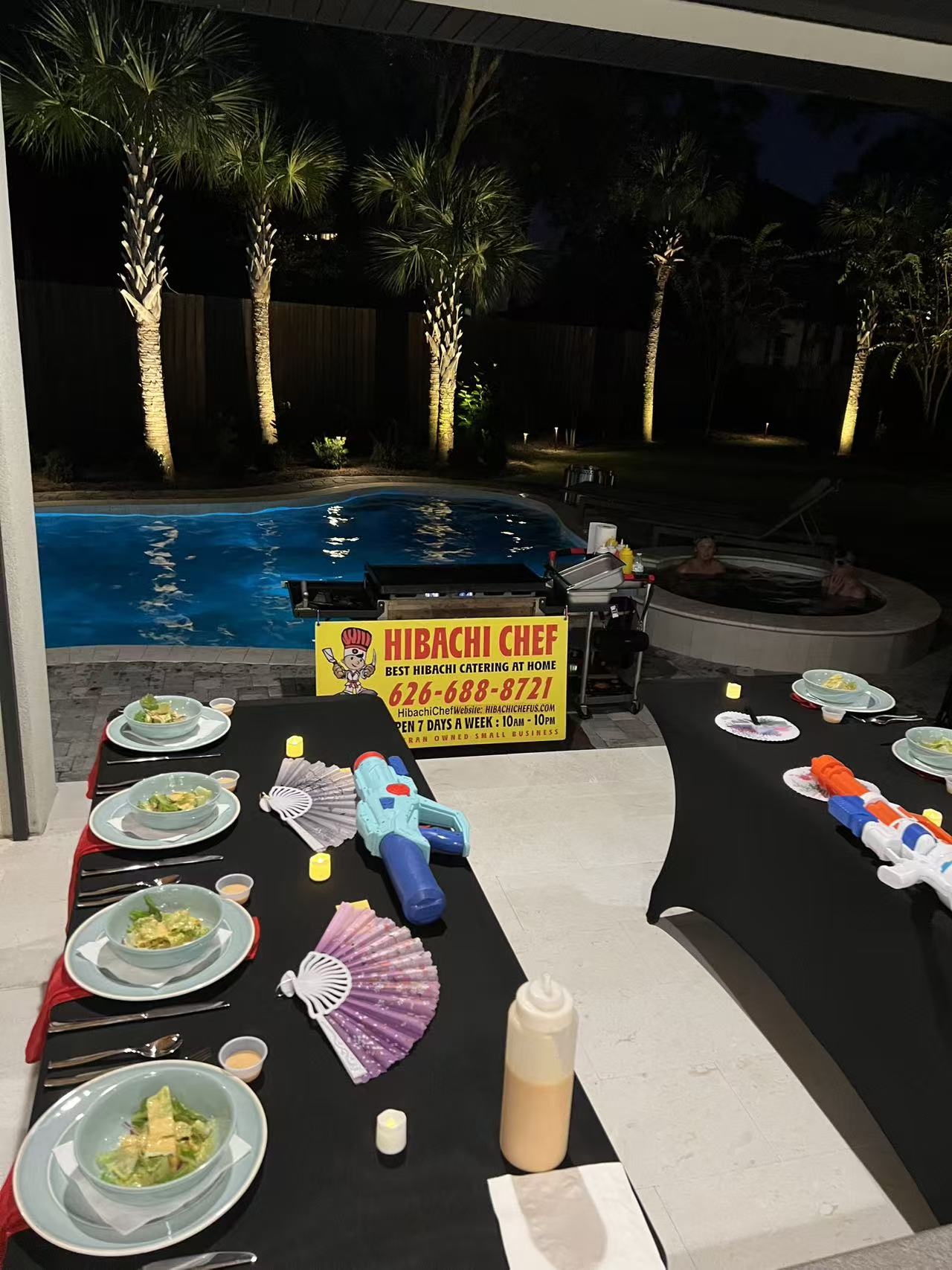 Private hibachi chef entertaining guests at home near Destin Florida 30A